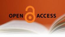 Open Access Week 2015 Orange open lock in the middle of the word open access all hovering over an open book